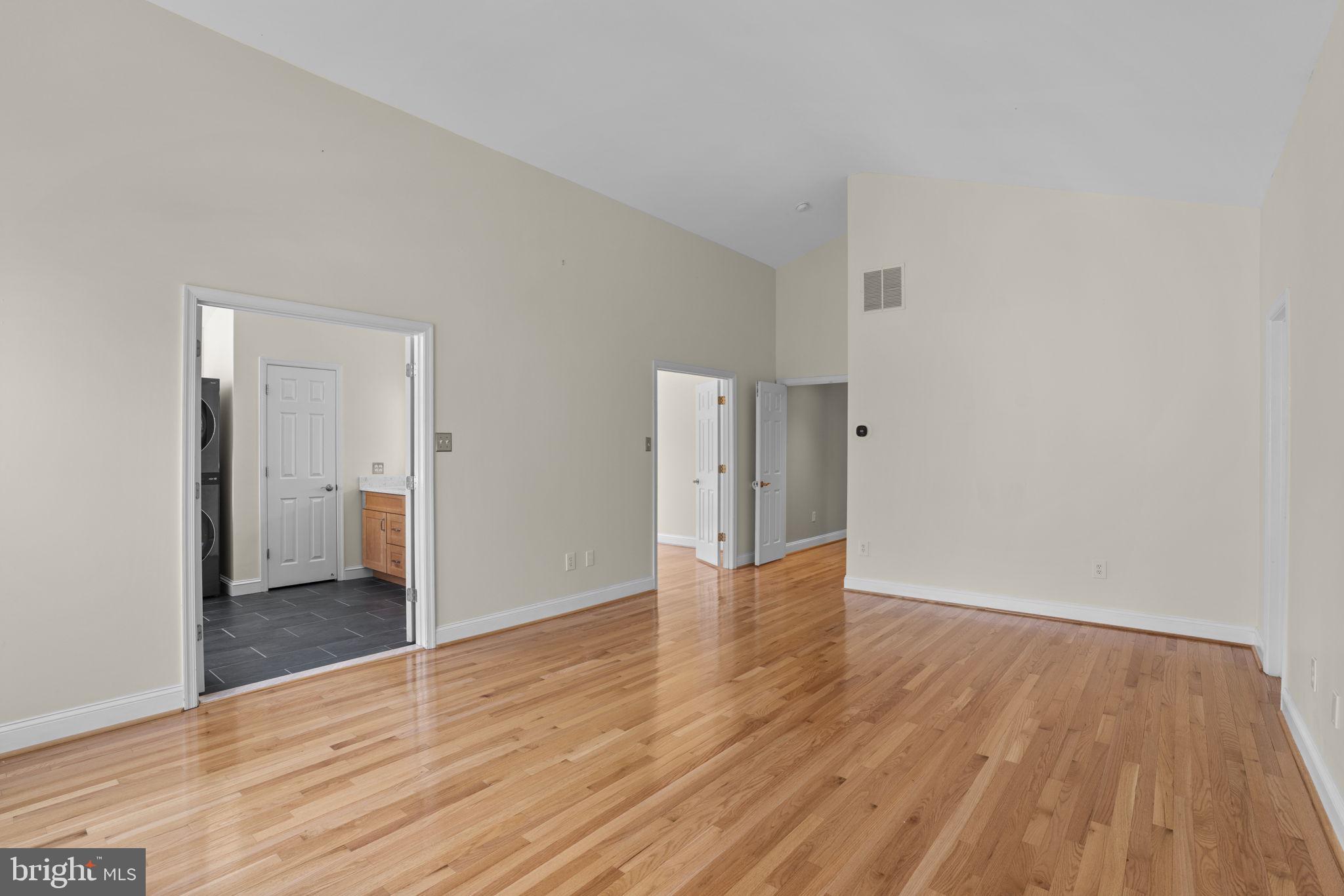 4520 Tulip Way Ellicott City, MD 21043 - Photo 27 of 63 a view of an empty room and wooden floor