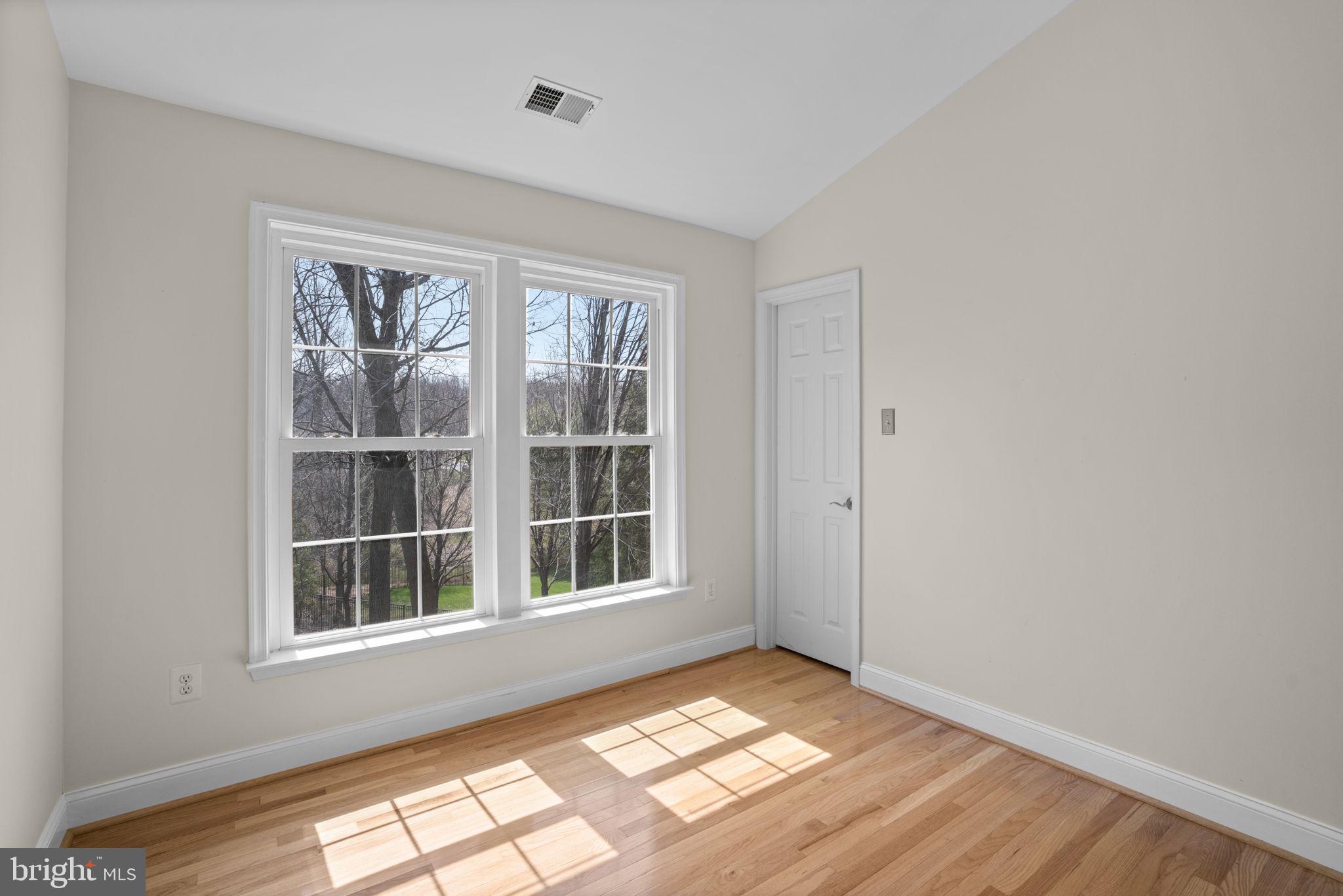 4520 Tulip Way Ellicott City, MD 21043 - Photo 33 of 63 a view of an empty room with a window