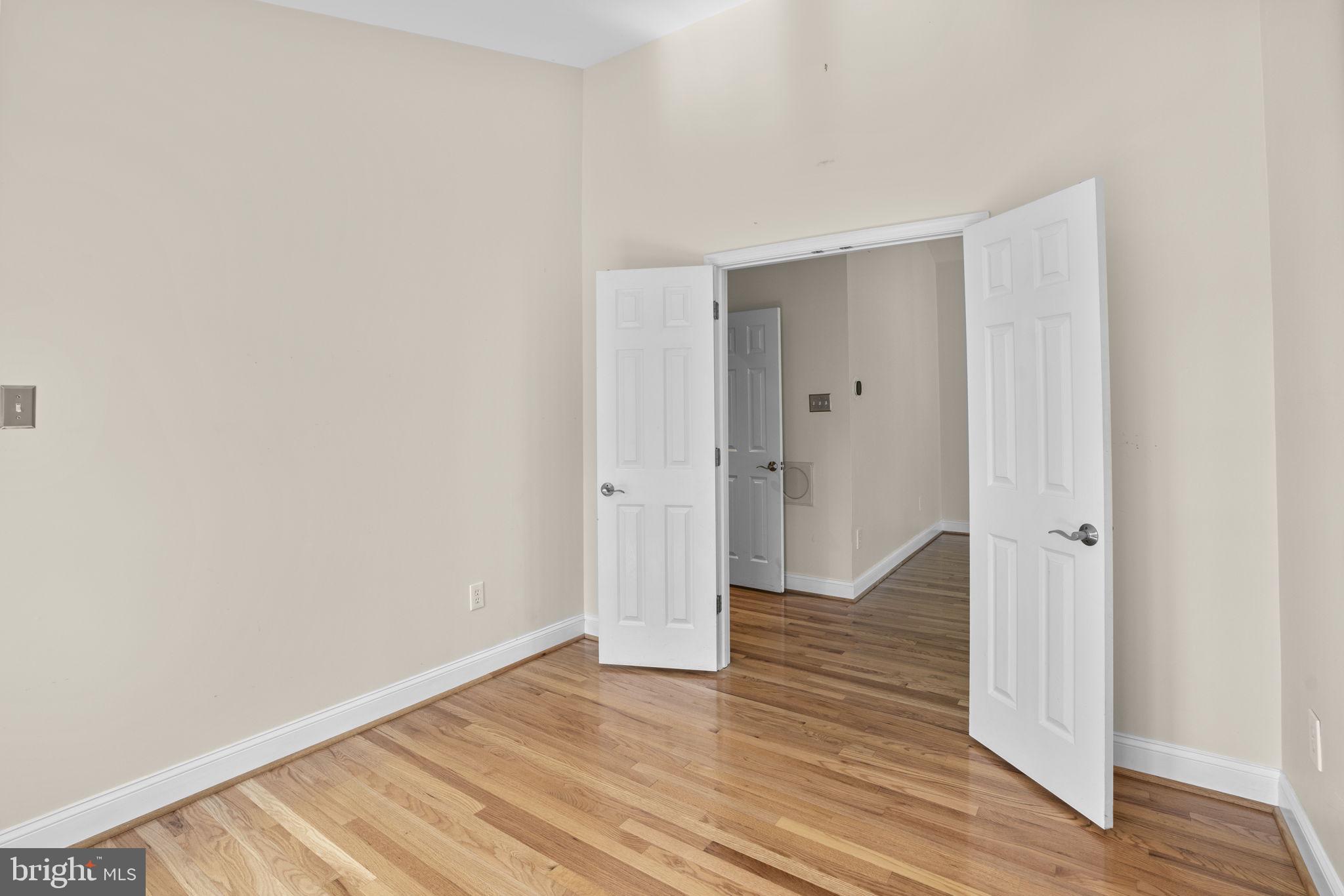 4520 Tulip Way Ellicott City, MD 21043 - Photo 34 of 63 a view of an empty room with wooden floor