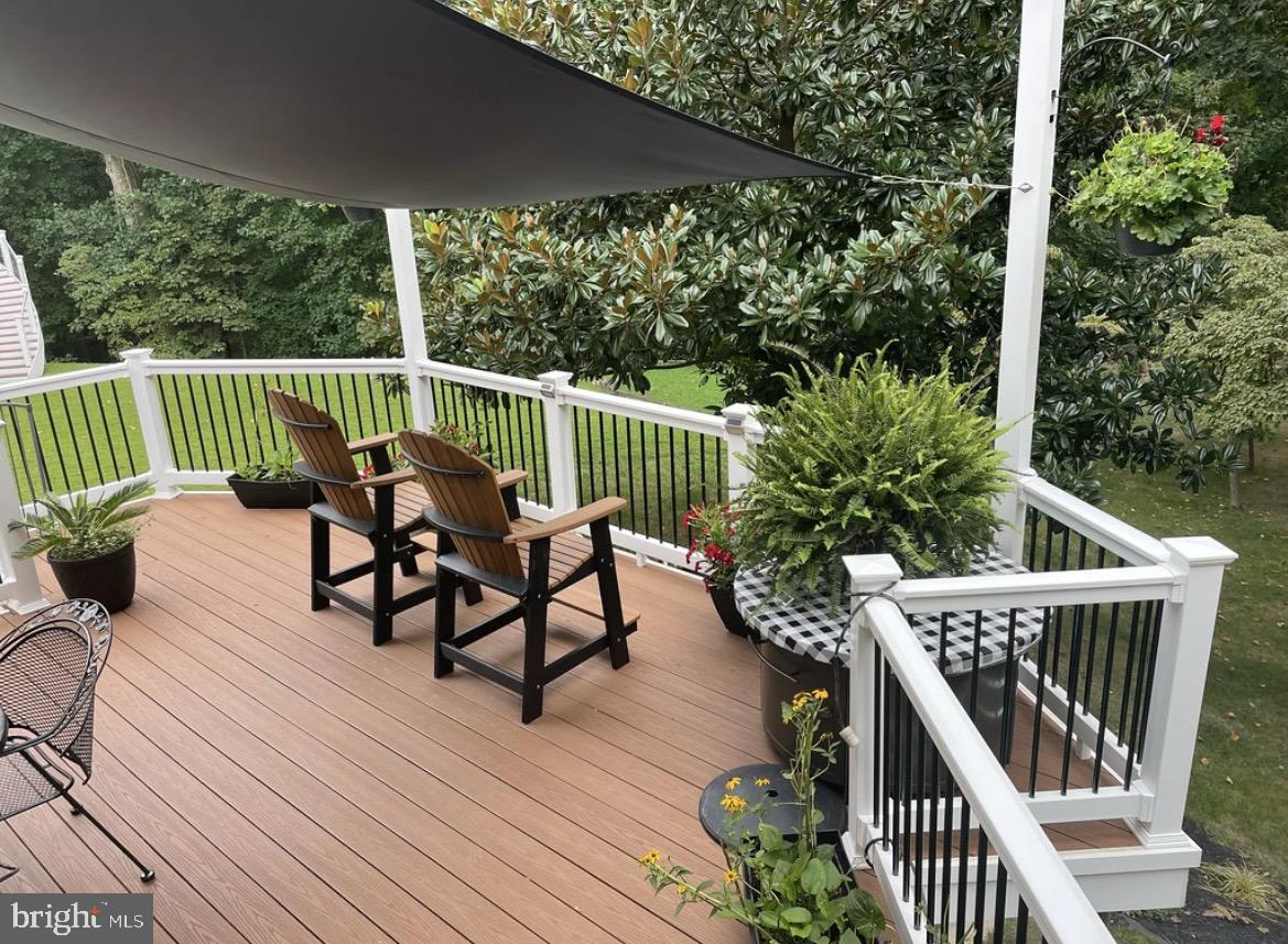 4520 Tulip Way Ellicott City, MD 21043 - Photo 50 of 63 a view of balcony with furniture and wooden deck