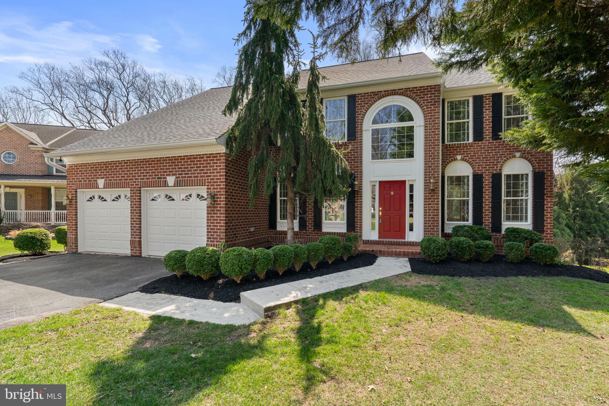 4520 Tulip Way Ellicott City, MD 21043 - Photo 58 of 63 2-car garage brick front colonial