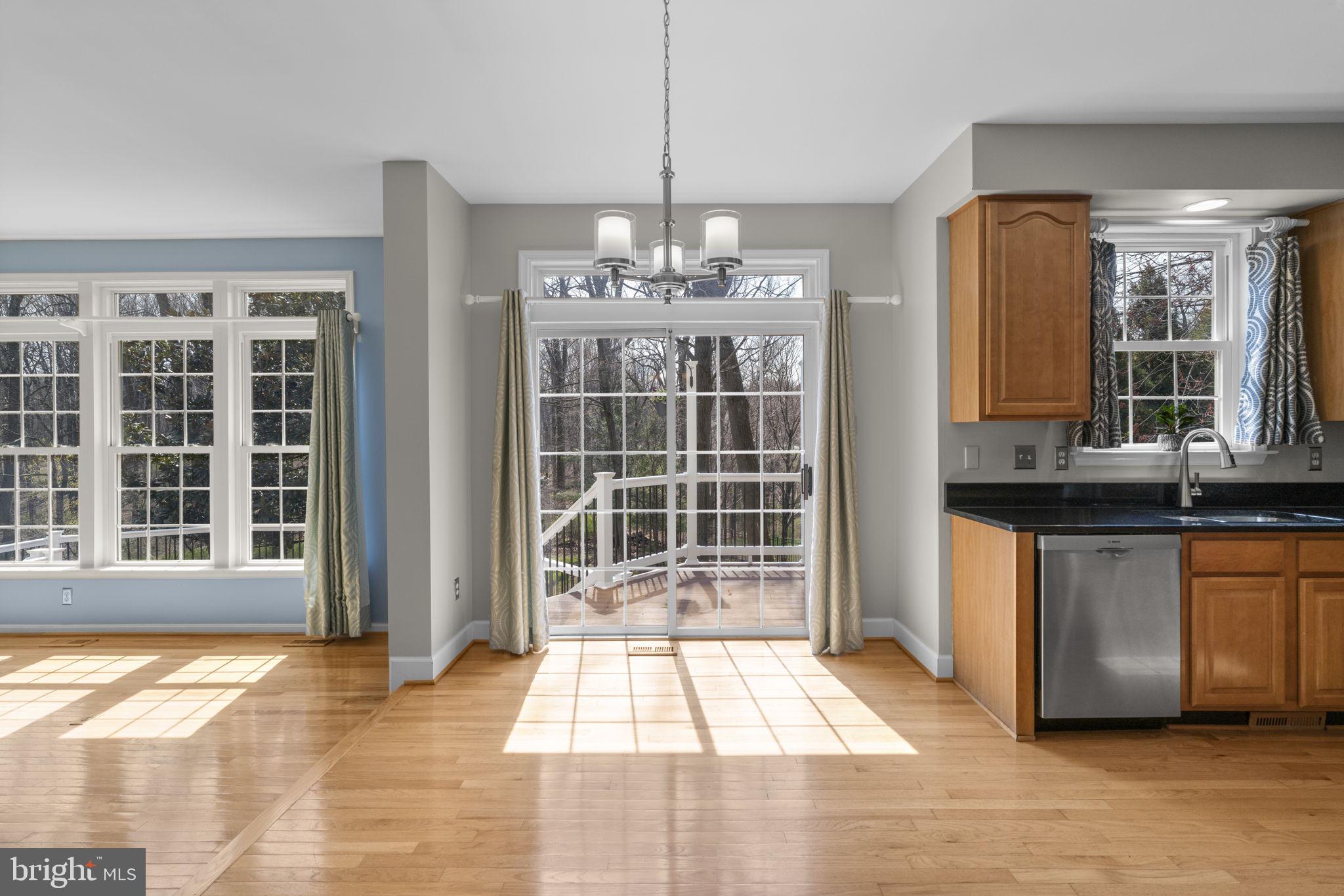 4520 Tulip Way Ellicott City, MD 21043 - Photo 7 of 63 Kitchen table space w/slider to rear deck