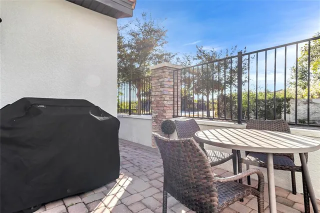 a view of a patio with a yard