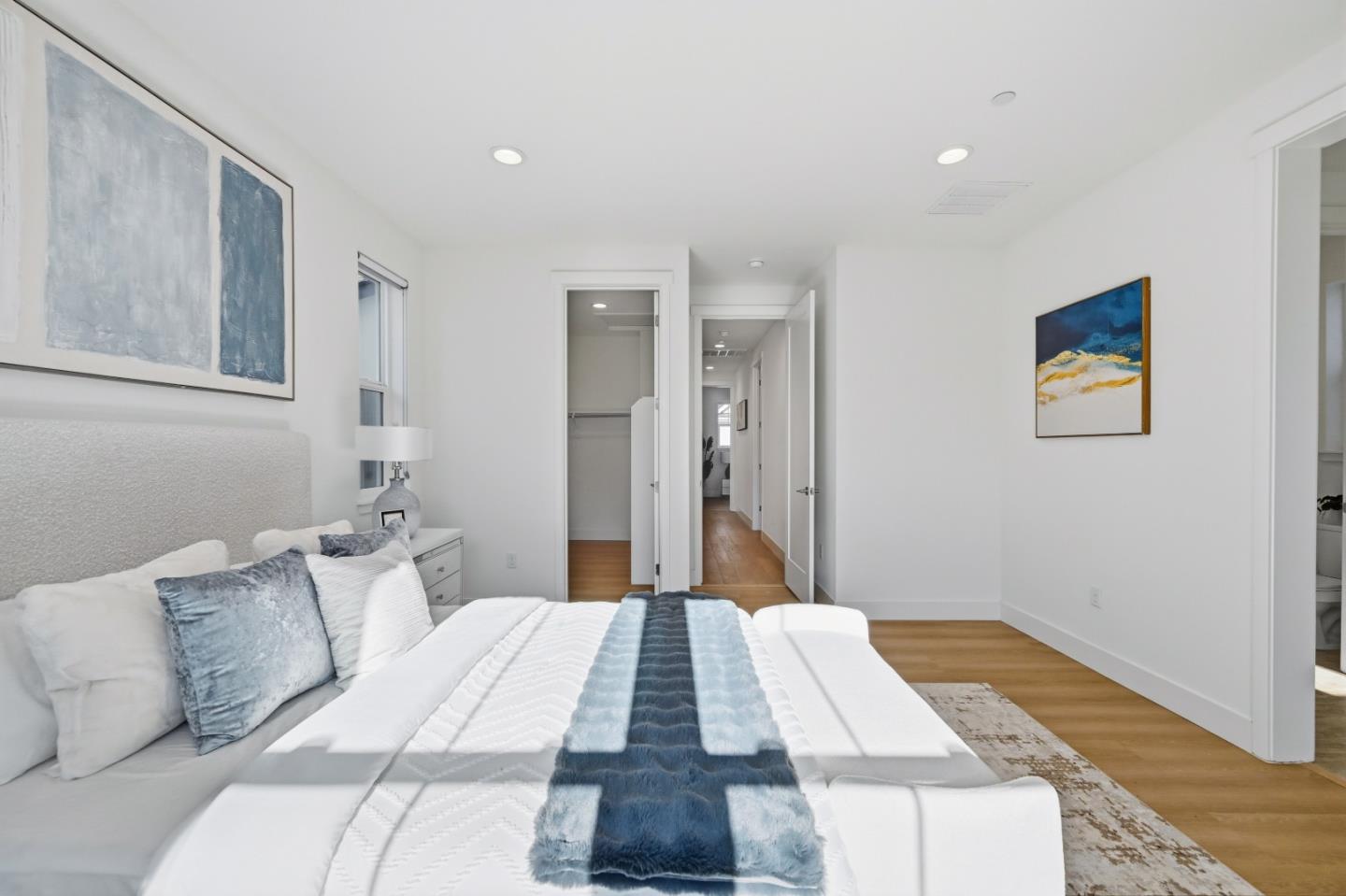 37471 Bay Crest Road Newark, CA 94560 - Photo 19 of 71 a bedroom with a bed and painting on the wall