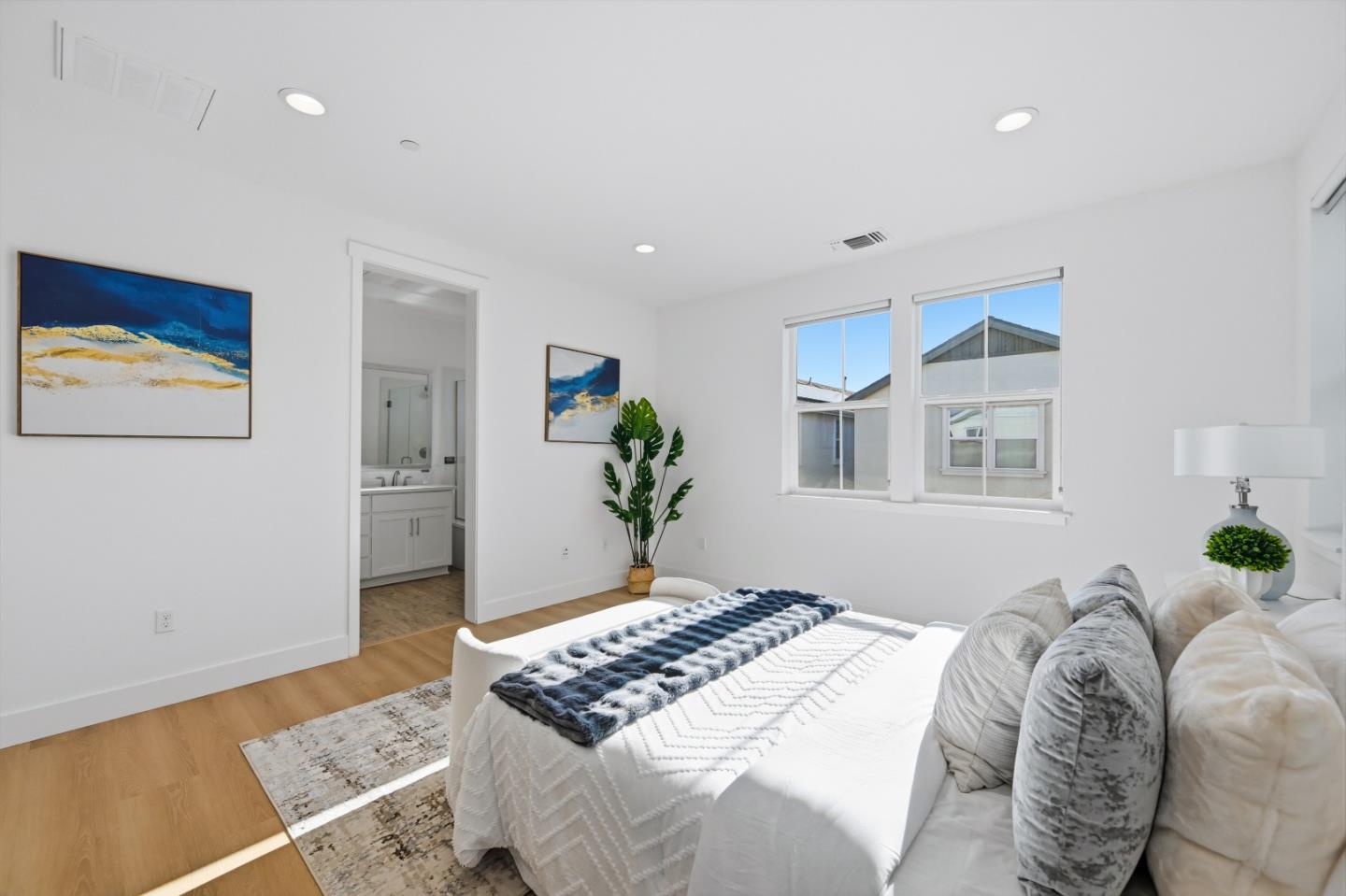 37471 Bay Crest Road Newark, CA 94560 - Photo 20 of 71 a bedroom with a bed and a painting on the wall