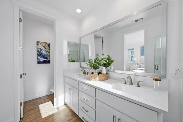 a bedroom with bed and window