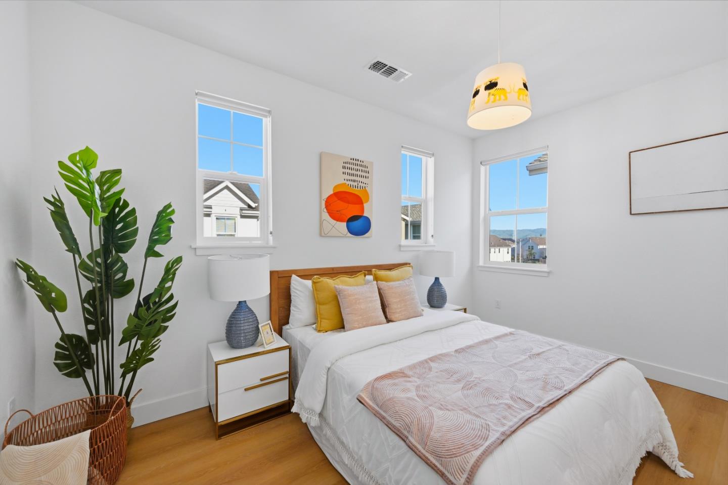 37471 Bay Crest Road Newark, CA 94560 - Photo 27 of 71 a bedroom with bed and a potted plant