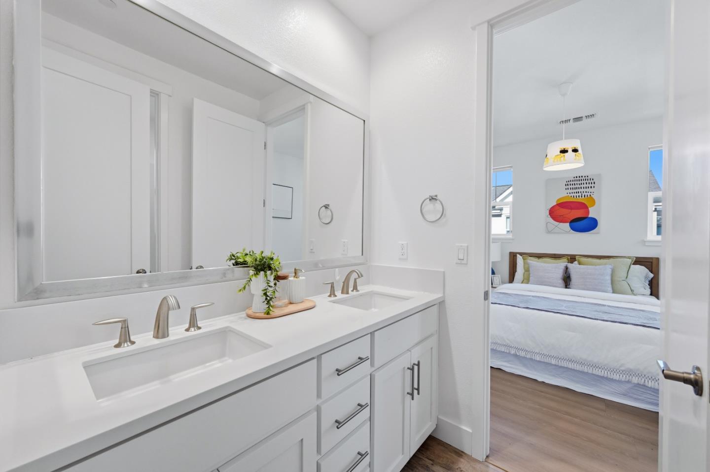 37471 Bay Crest Road Newark, CA 94560 - Photo 28 of 71 a bathroom with double vanity sinks and a vanity