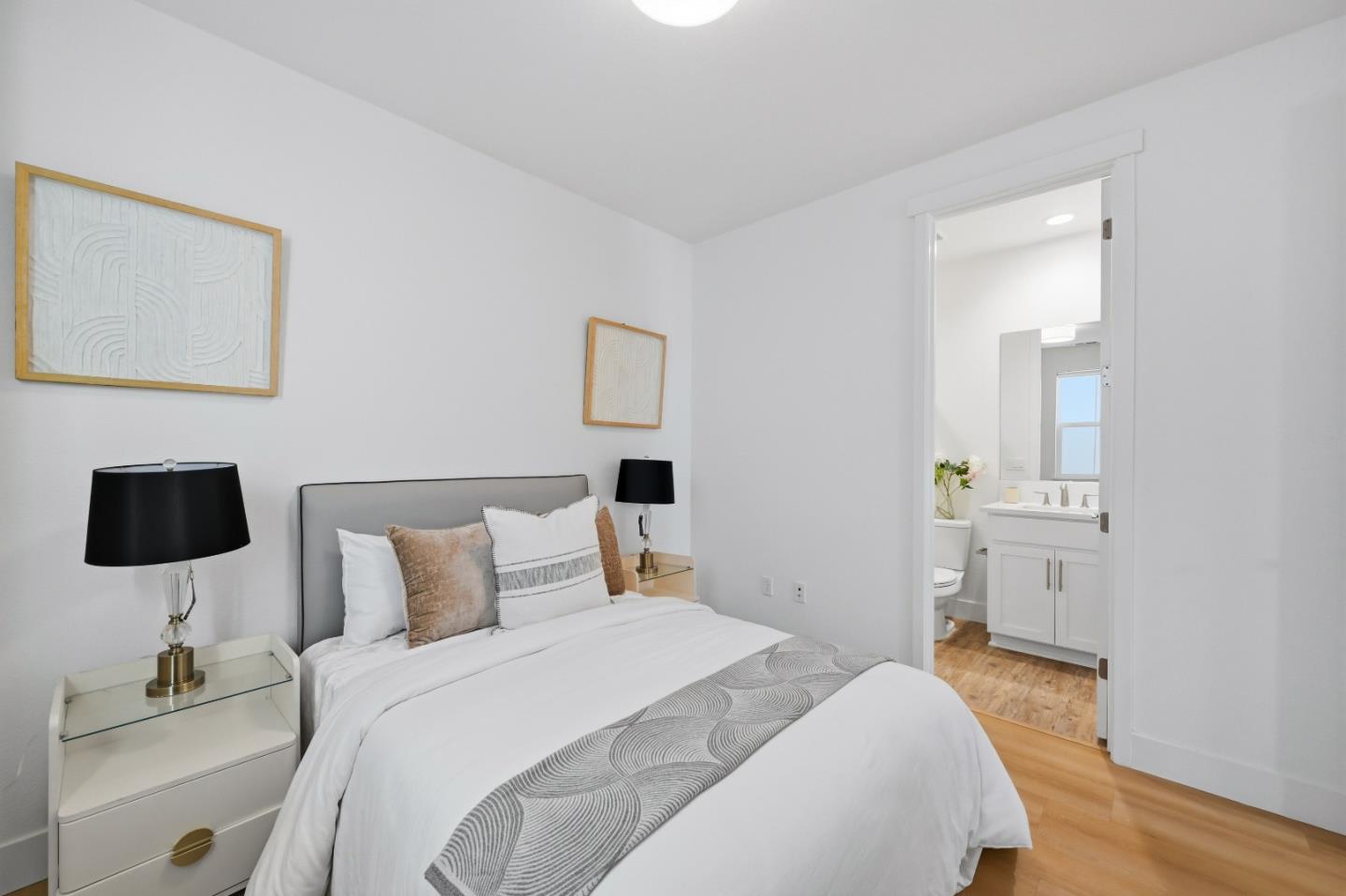 37471 Bay Crest Road Newark, CA 94560 - Photo 34 of 71 a bedroom with a bed and a flat tv screen on a table