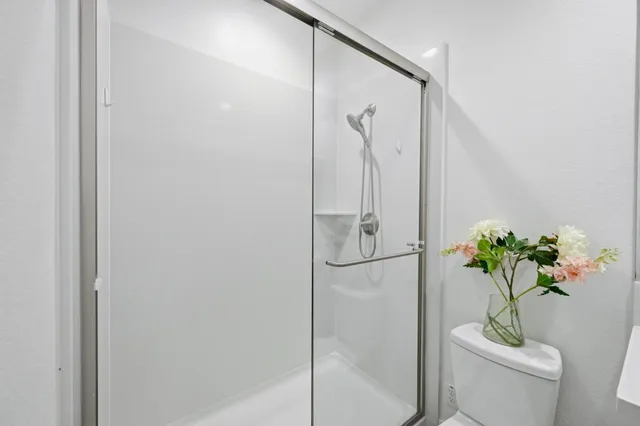 a view of balcony with furniture