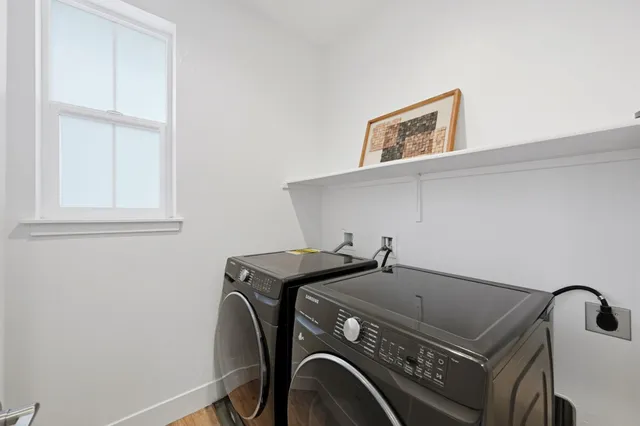 a front view of a house with a garage