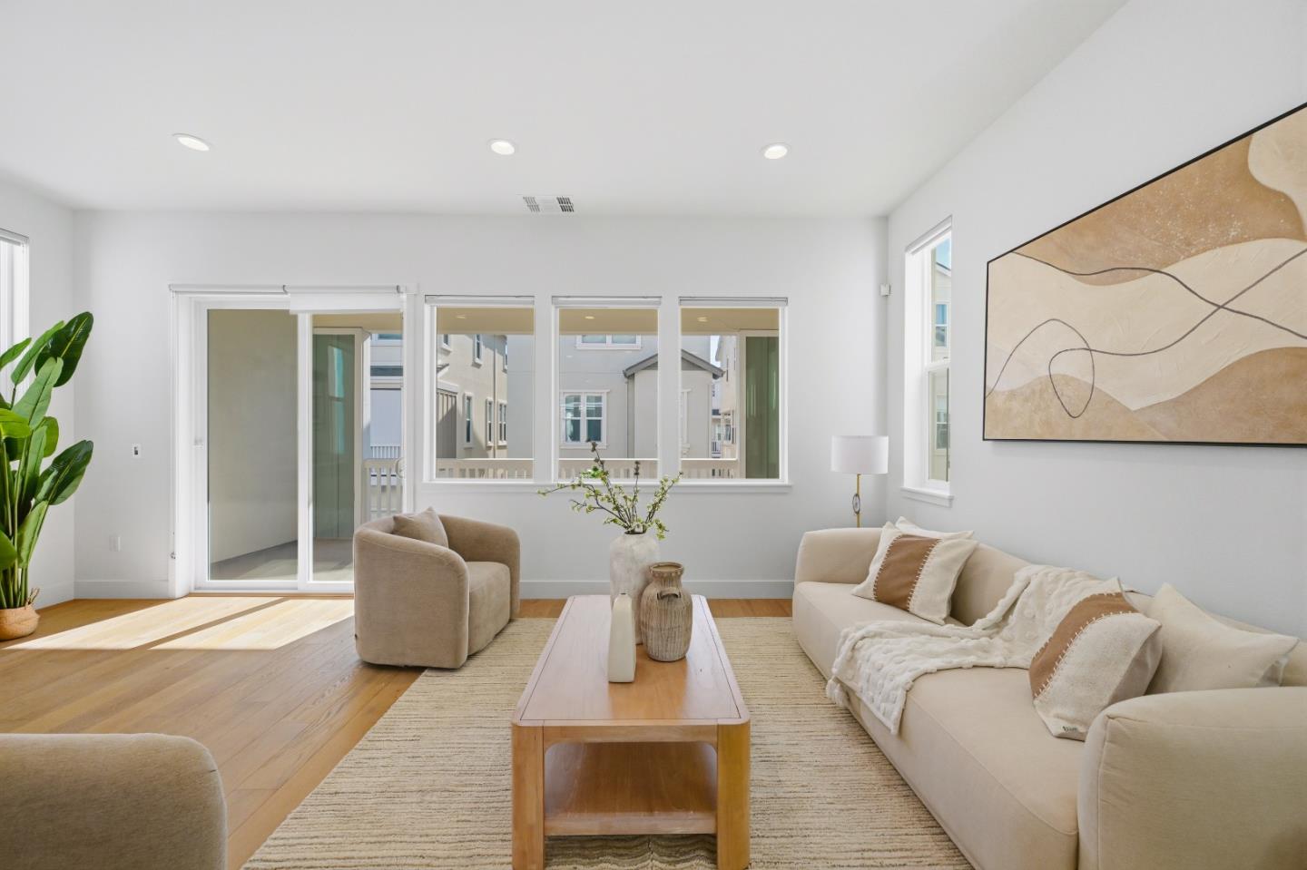 37471 Bay Crest Road Newark, CA 94560 - Photo 5 of 71 a living room with furniture and a potted plant