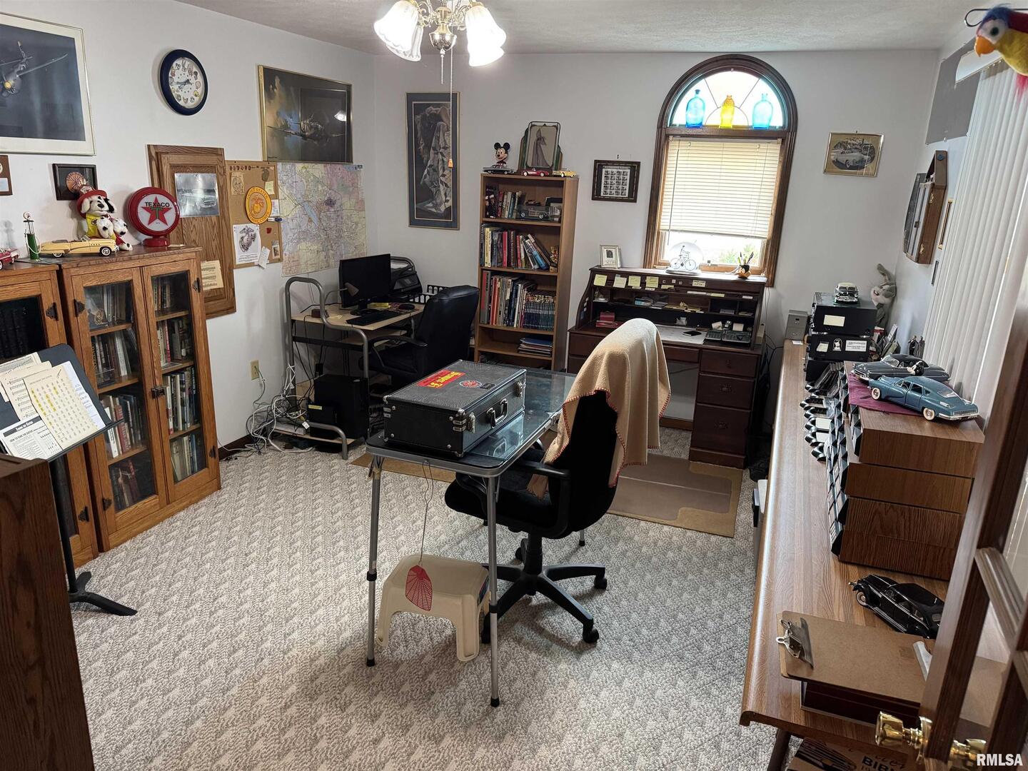 8424 Bolen Store Road Thompsonville, IL 62890 - Photo 16 of 30 a view of a workspace with furniture and a window