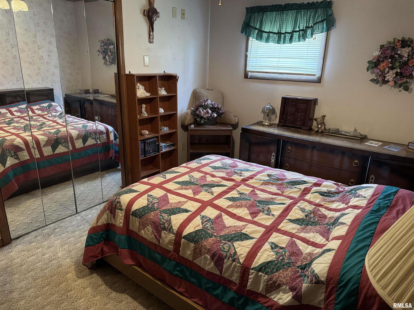 8424 Bolen Store Road Thompsonville, IL 62890 - Photo 20 of 30 a bedroom with a bed and a dresser