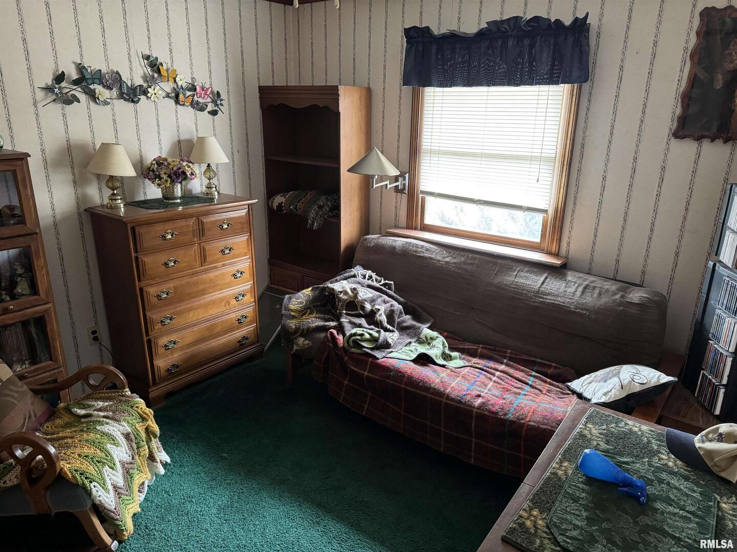 8424 Bolen Store Road Thompsonville, IL 62890 - Photo 23 of 30 a bedroom with a bed and a window