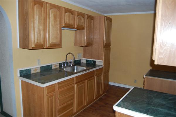 1814 Barre Road Hardwick, MA 01031 - Photo 8 of 16 a kitchen with a sink cabinets and a window