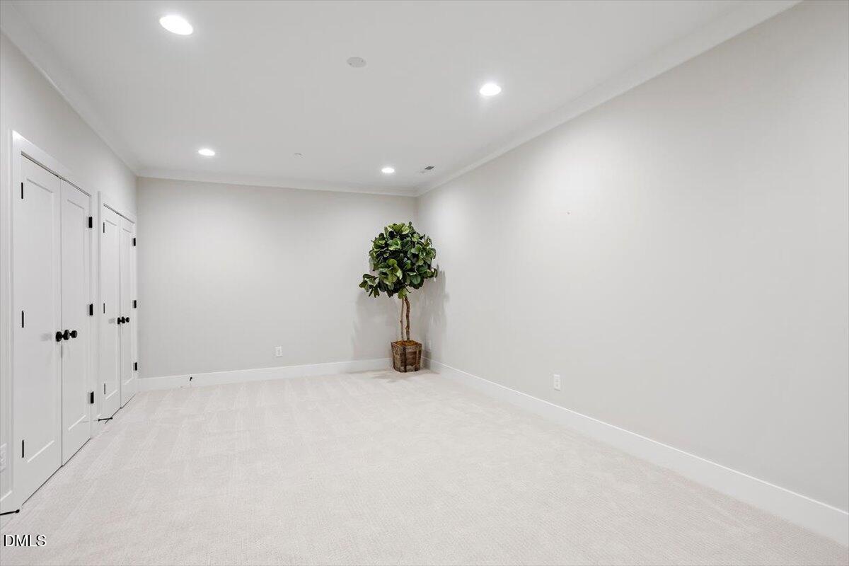 811 Maple Berry Lane, Unit 101 Raleigh, NC 27607 - Photo 36 of 45 a view of an empty room