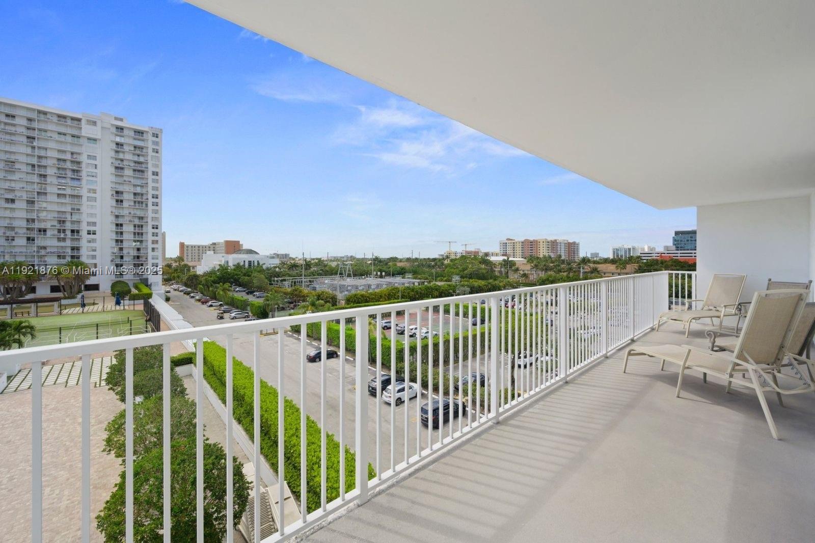 2851 Northeast 183rd Street, Unit 502E Aventura, FL 33160 - Photo 12 of 25 a view of balcony with furniture