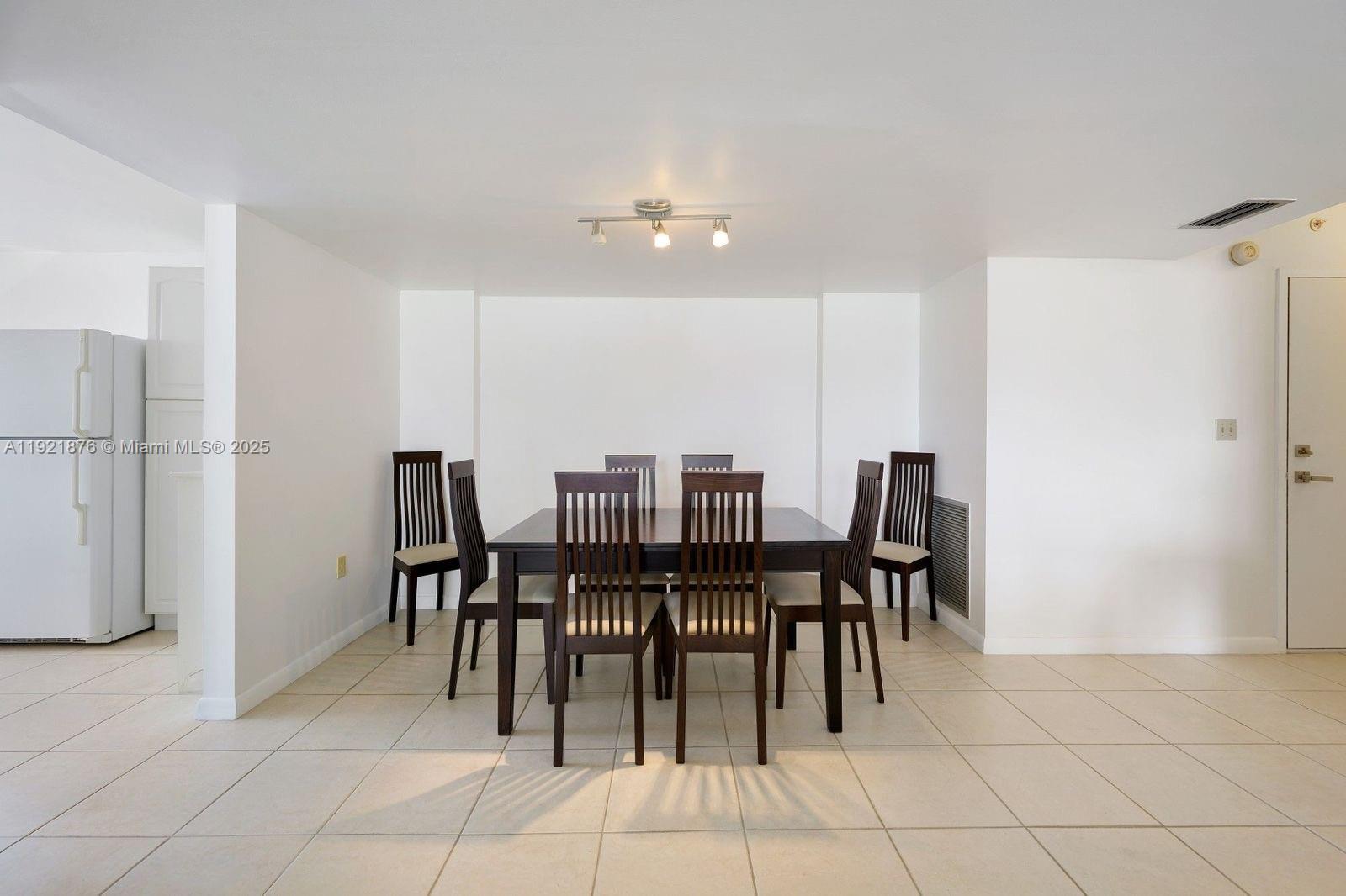 2851 Northeast 183rd Street, Unit 502E Aventura, FL 33160 - Photo 2 of 25 a view of a dining room with furniture