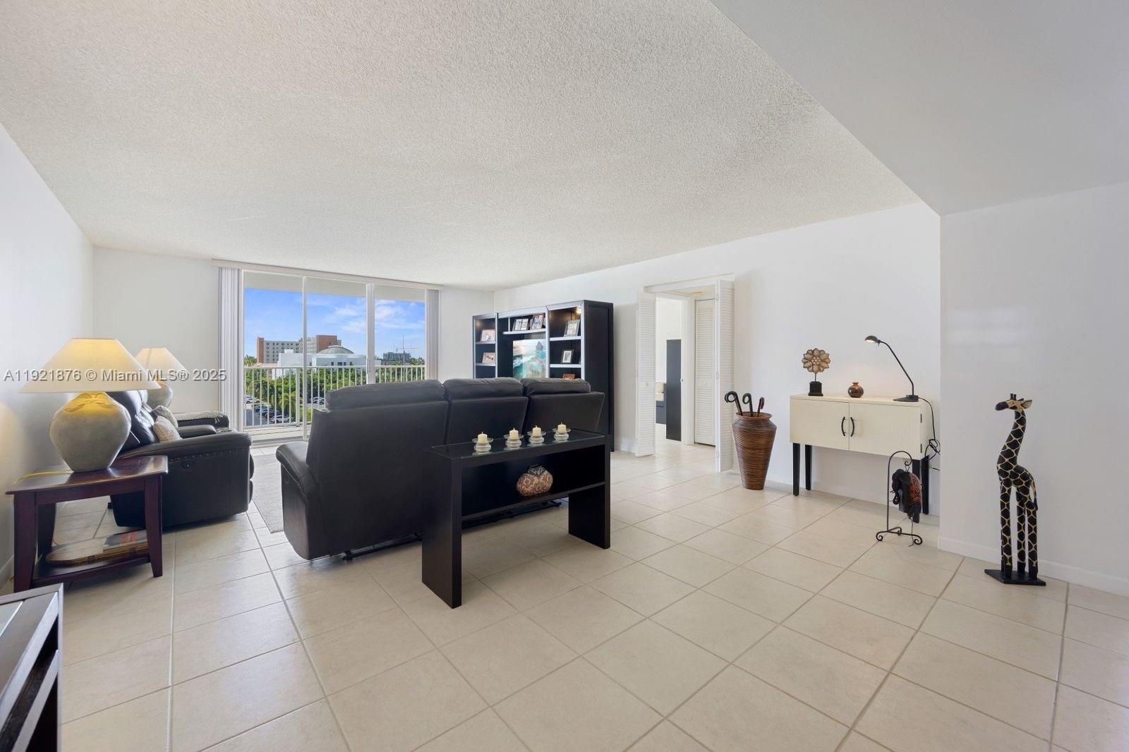2851 Northeast 183rd Street, Unit 502E Aventura, FL 33160 - Photo 7 of 25 a living room with furniture and furniture