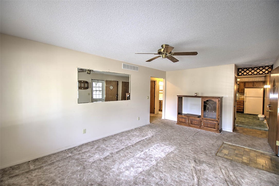 2273 North Fairview Avenue Decatur, IL 62526 - Photo 5 of 24 a view of a livingroom with a fireplace