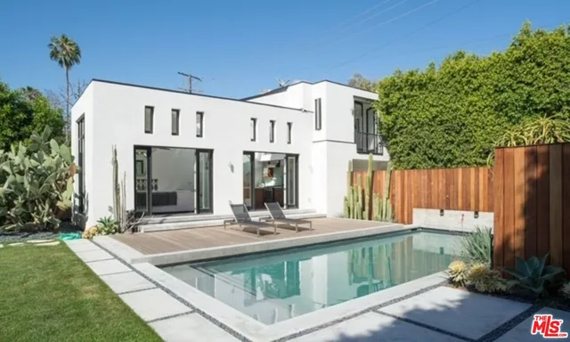 a view of house with yard outdoor seating and entertaining space