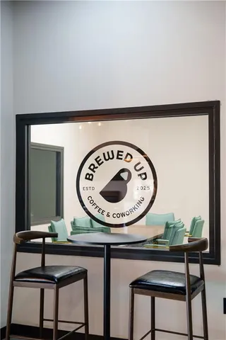 a view of a hallway with elevator