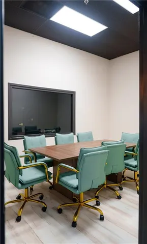 a view of a workspace with furniture