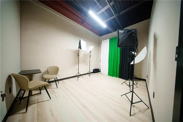 a workspace with furniture and a window