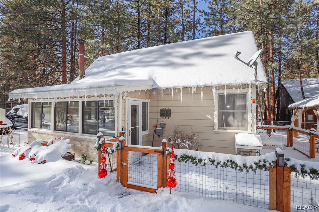 39016 1/2 Robin Road Big Bear Lake, CA 92315 - Photo 22 of 23 a view of a house with sitting area and front view of a house