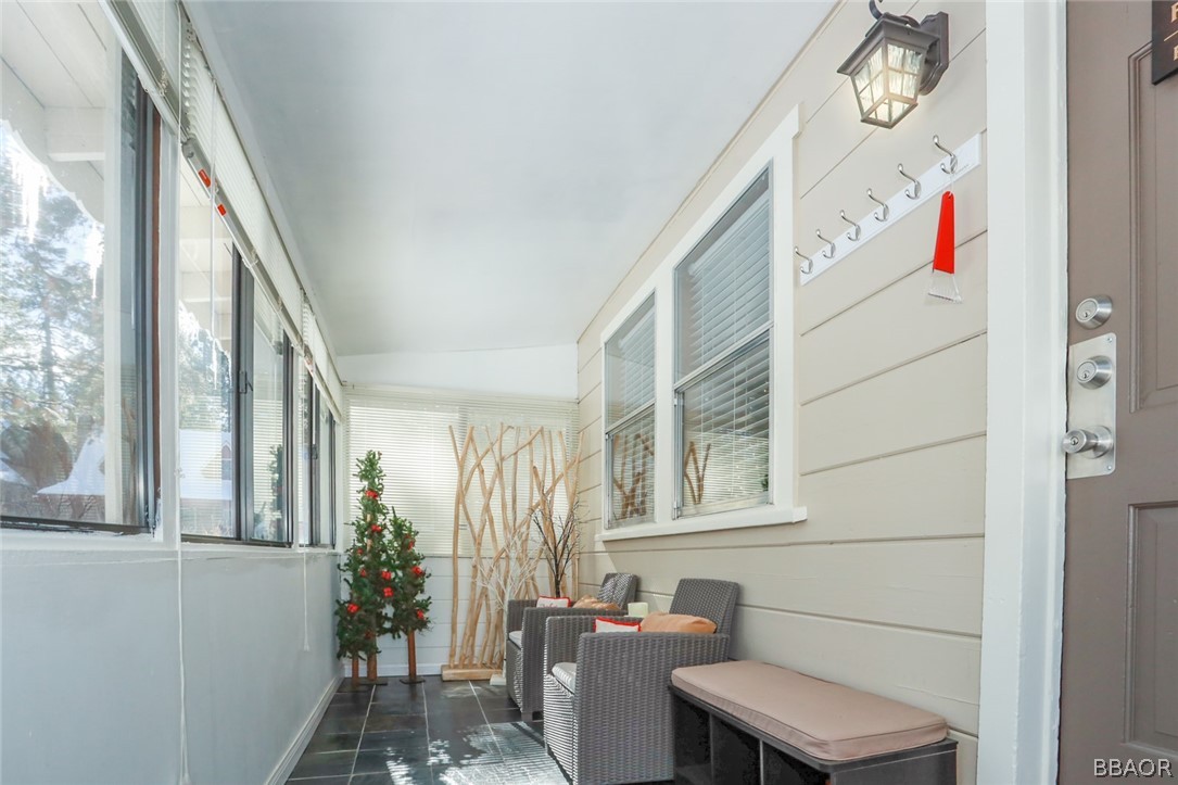 39016 1/2 Robin Road Big Bear Lake, CA 92315 - Photo 3 of 23 a bathroom with a toilet a sink and a window