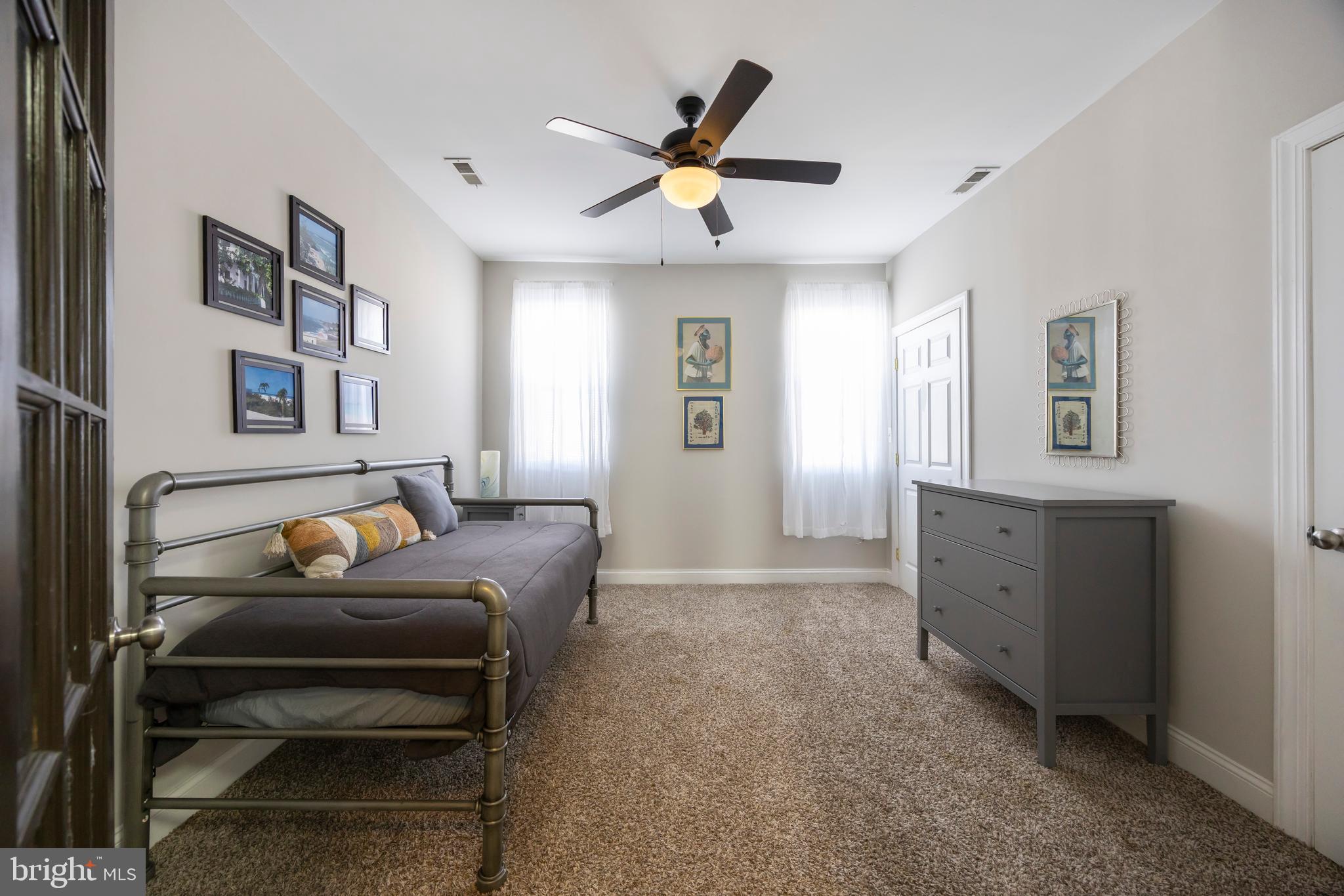 314 East 22nd Street Baltimore, MD 21218 - Photo 26 of 34 a living room with furniture and window