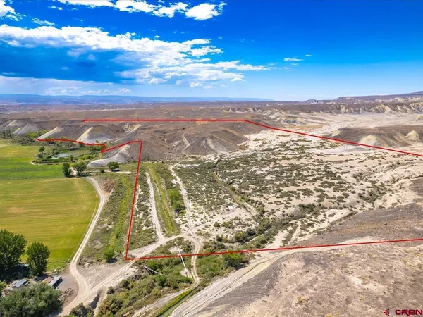 a view of a city with an ocean