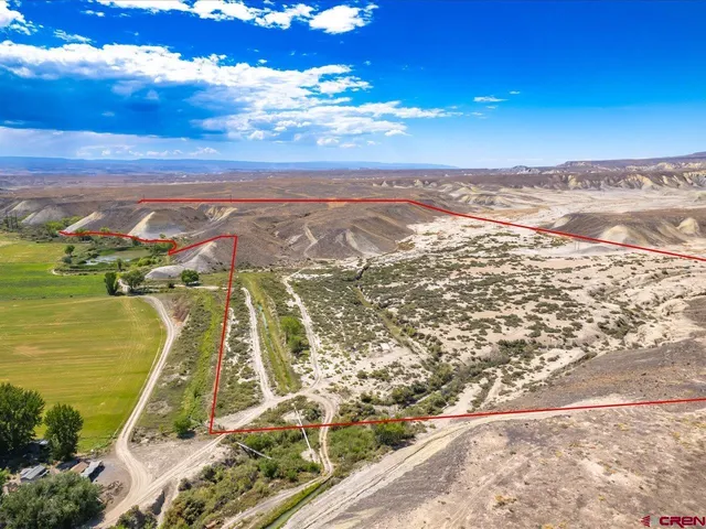 a view of a city with an ocean