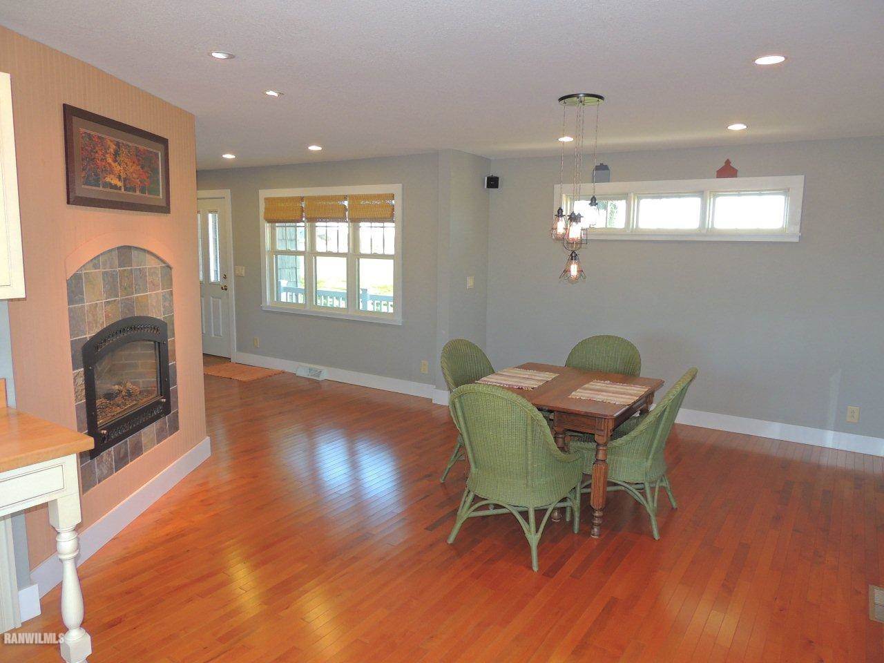 2285 South Massbach Road Stockton, IL 61085 - Photo 4 of 25 a view of a dining room with furniture and wooden floor