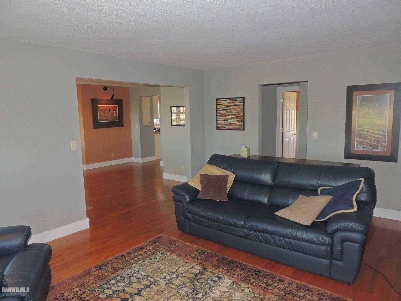 2285 South Massbach Road Stockton, IL 61085 - Photo 5 of 25 a living room with furniture and a rug