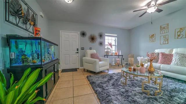 a kitchen with a stove a refrigerator and a sink