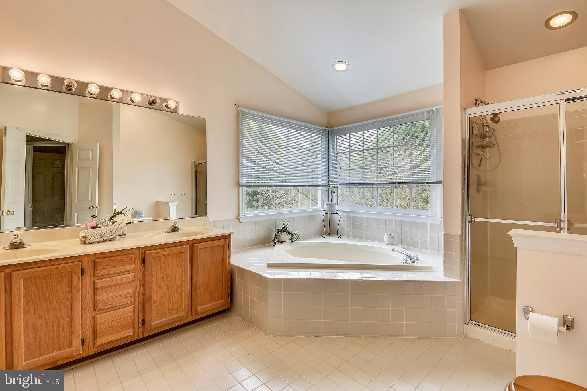 1775 Rochester Street Crofton, MD 21114 - Photo 22 of 46 Master Bathroom - double vanity & linen closet