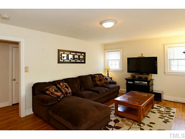 2703 Richwood Road Durham, NC 27705 - Photo 3 of 18 The cozy Living Room has neutral colors and hardwood floors that will compliment anyones style. Living Room