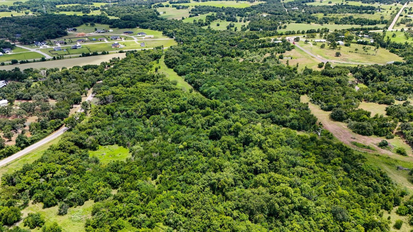 3000 Tract 1 Elgin, TX 78621 - Photo 17 of 18 an aerial view of residential house with outdoor space and trees all around