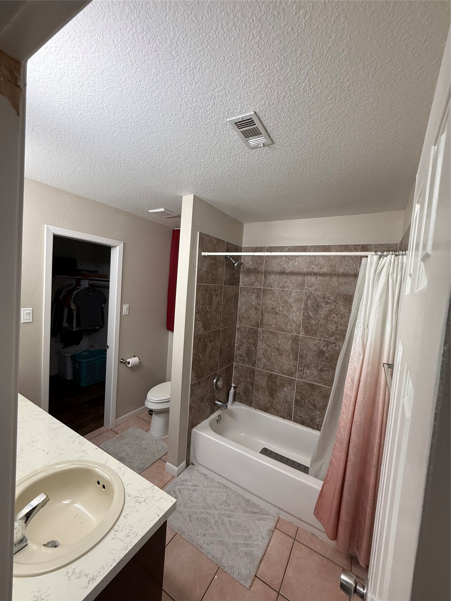 3103 Pine Dust Lane Spring, TX 77373 - Photo 14 of 29 a bathroom with a sink a toilet and shower
