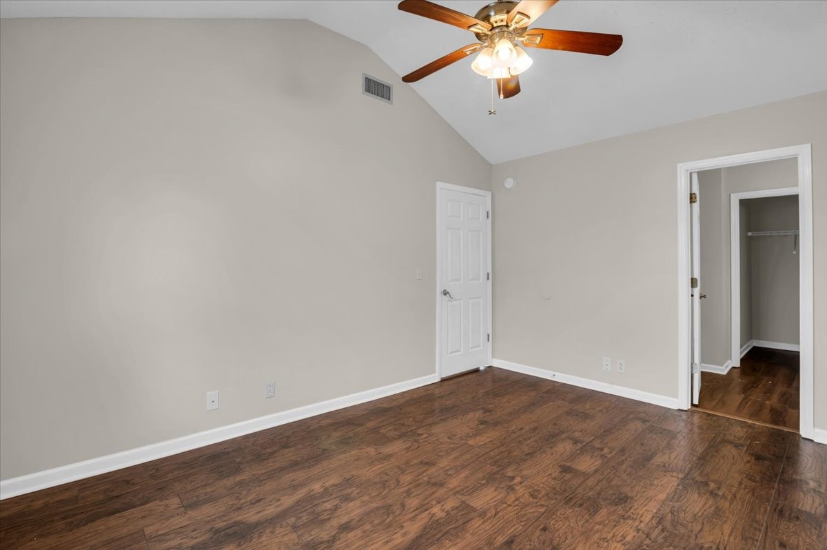 2765 Windwalker Court Murfreesboro, TN 37128 - Photo 16 of 31 an empty room with wooden floor fan and windows