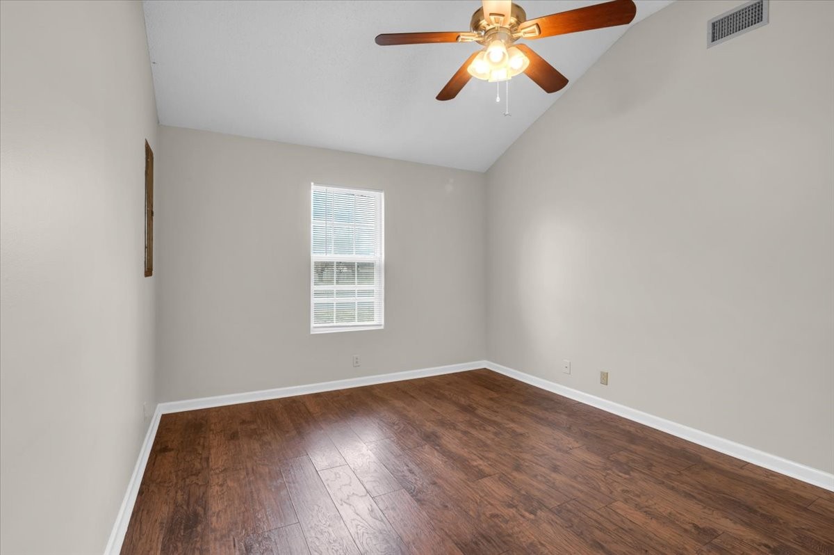 2765 Windwalker Court Murfreesboro, TN 37128 - Photo 21 of 31 wooden floor in an empty room with a window