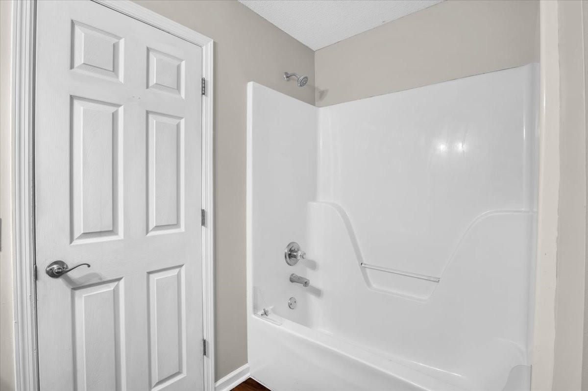 2765 Windwalker Court Murfreesboro, TN 37128 - Photo 24 of 31 a bathroom with bathtub and shower