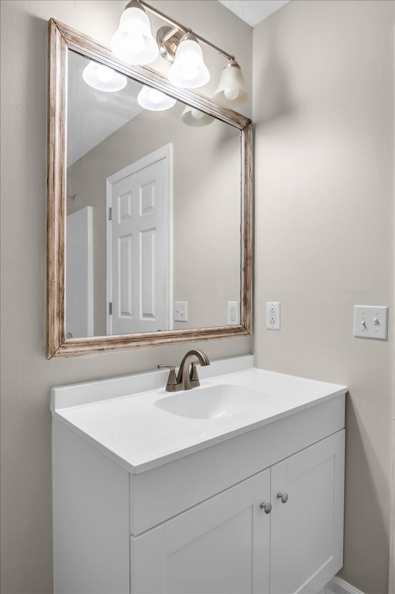 2765 Windwalker Court Murfreesboro, TN 37128 - Photo 25 of 31 a bathroom with a sink and a mirror