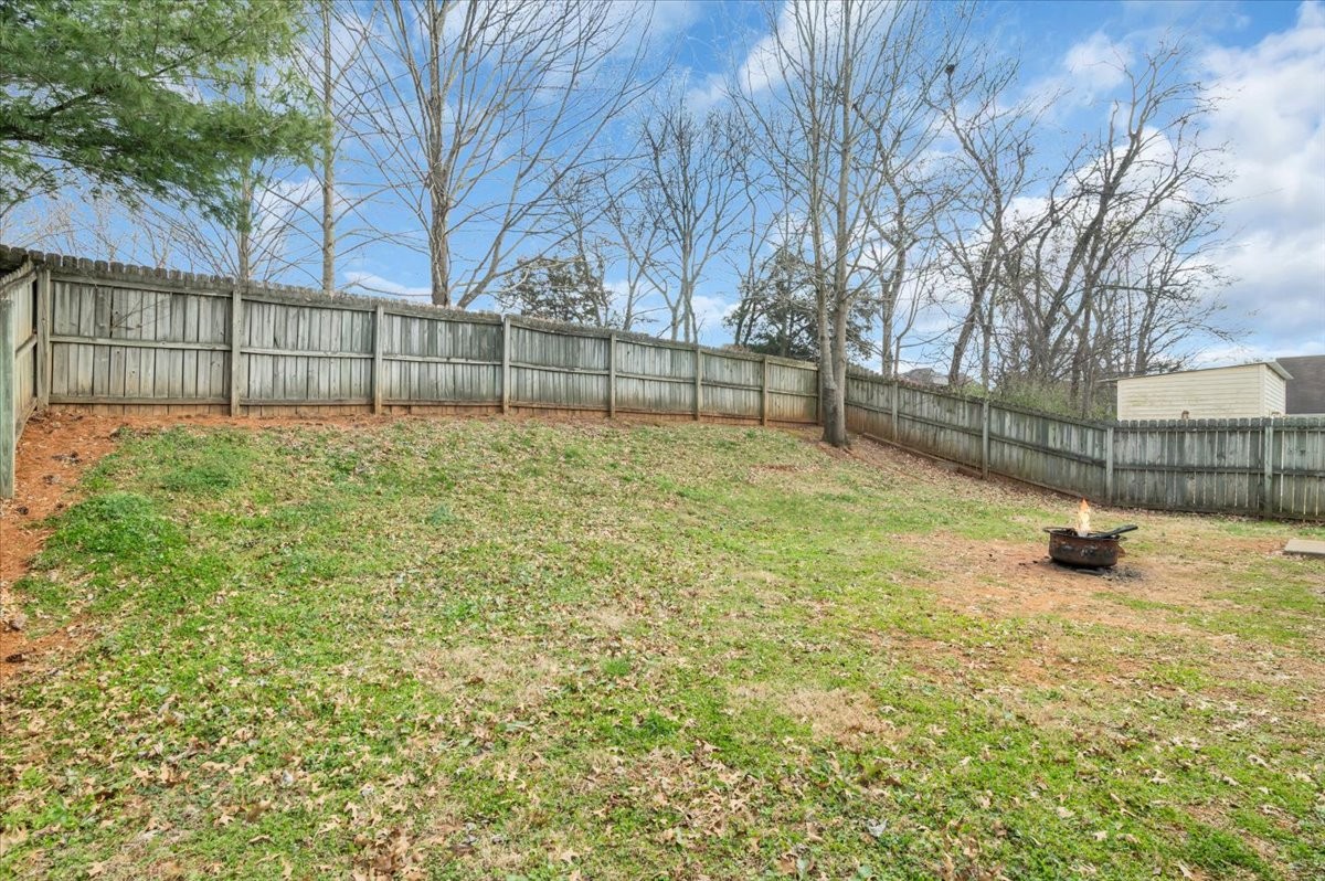 2765 Windwalker Court Murfreesboro, TN 37128 - Photo 26 of 31 a view of a yard with wooden fence
