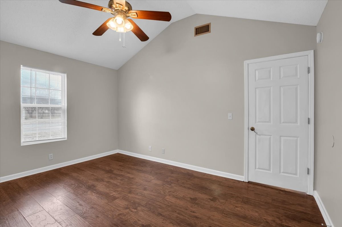 2765 Windwalker Court Murfreesboro, TN 37128 - Photo 5 of 31 wooden floor in an empty room with a window