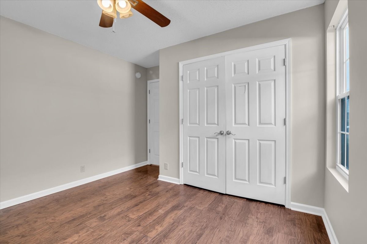2765 Windwalker Court Murfreesboro, TN 37128 - Photo 10 of 31 an empty room with wooden floor ceiling fan