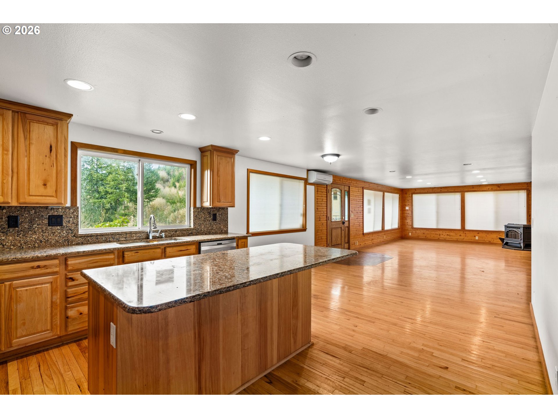 7470 Maple Creek Road Westlake, OR 97493 - Photo 11 of 33 a view of a kitchen with large windows