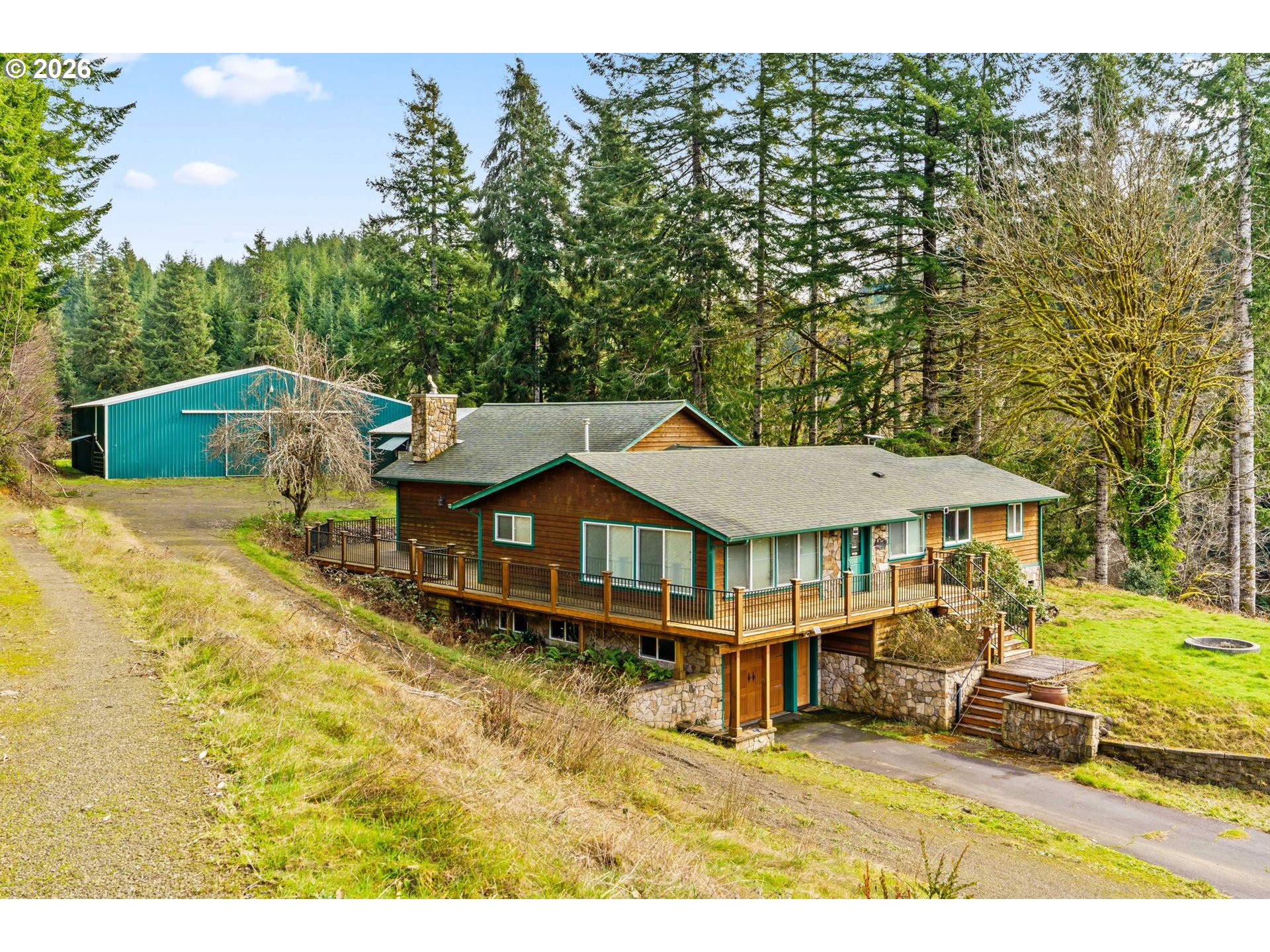 7470 Maple Creek Road Westlake, OR 97493 - Photo 2 of 33 a view of a house with pool and chairs